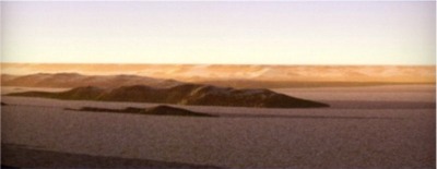 Simulation de la terraformation de Mars au niveau de Valles Marineris. La nouvelle atmosphre pige la chaleur solaire. Le sol se rchauffe, la glace fond, l'eau apparat partout. La Terre  la fin du Deuxime Jour et au dbut du Troisime devait avoir cet aspect.